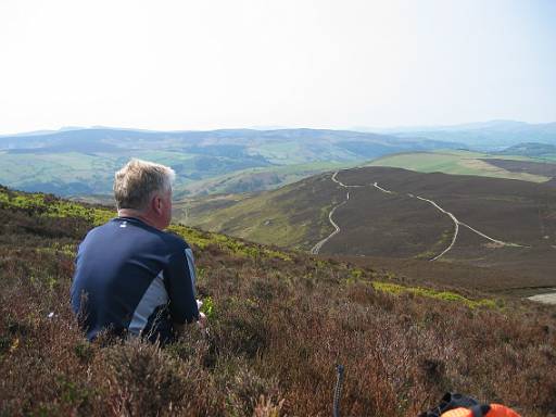 12_45-1.JPG - Mick having lunch on Moel Morfydd with views to Snowdonia